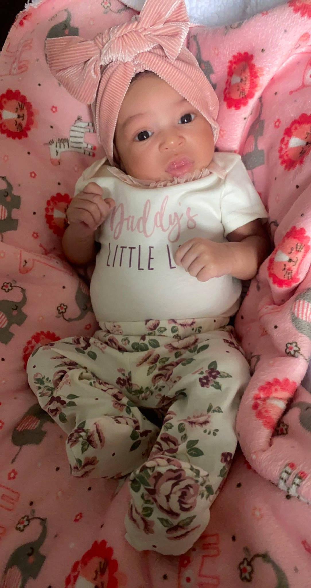 Jermani joined the competition — help win amazing prizes! baby, baby_sleeping, baby_toddler_clothing, cap, cheek, comfort, face, facial_expression, finger, hand, head, headwear, lip, pattern, person, pink, skin, sleeve, textile, thigh