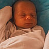 Loki joined the competition — help win amazing prizes! baby, newborn, sleeping, blanket, soft, cozy, face, infant, peaceful, wrapped, cute, child, indoors, portrait, resting, blue, white, bed, warm, calm