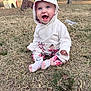 Ryleigh Graffam joined the competition — help win amazing prizes! baby, child, hoodie, floral_pants, grass, outdoor, smile, happy, sitting, nature, trees, leaf_litter, cute, infant, casual_clothing, bright_eyes, playful, seasonal, joyful, portrait