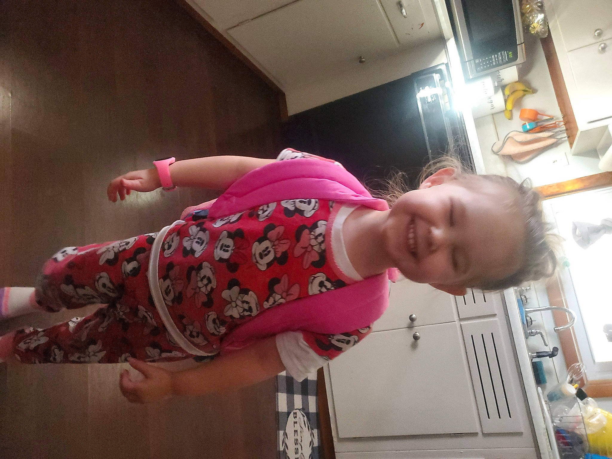 Emmaleigh is registered to the contest to win money with this photo: baby, baby_toddler_clothing, child, elbow, fashion_design, flooring, fun, happy, human_leg, joy, magenta, pattern, peach, person, pink, room, sandal, sleeve, smile, thigh