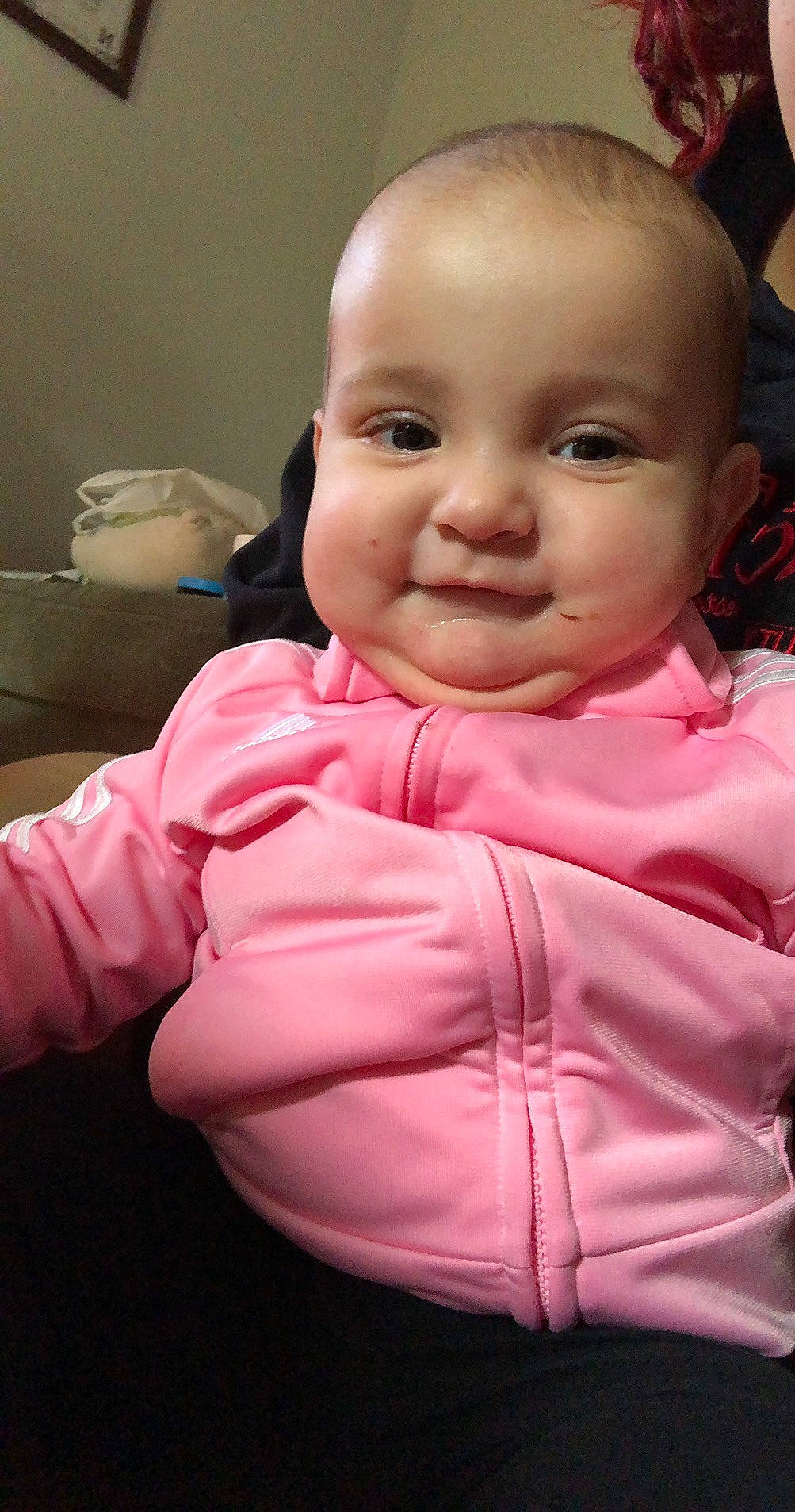 Jocelyn is registered to the contest to win money with this photo: baby, baby_toddler_clothing, cheek, comfort, ear, eye, eyebrow, eyelash, gesture, happy, human_body, iris, lip, magenta, nose, person, pink, sleeve, smile, thumb