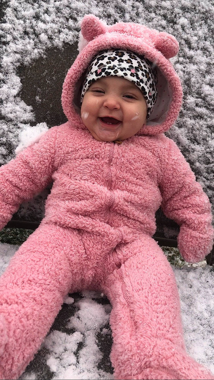 Jocelyn joined the competition — help win amazing prizes! baby, baby_toddler_clothing, cap, cheek, clothing, face, headgear, headwear, jacket, joy, organ, outerwear, person, photograph, pink, purple, red, skin, sleeve, smile