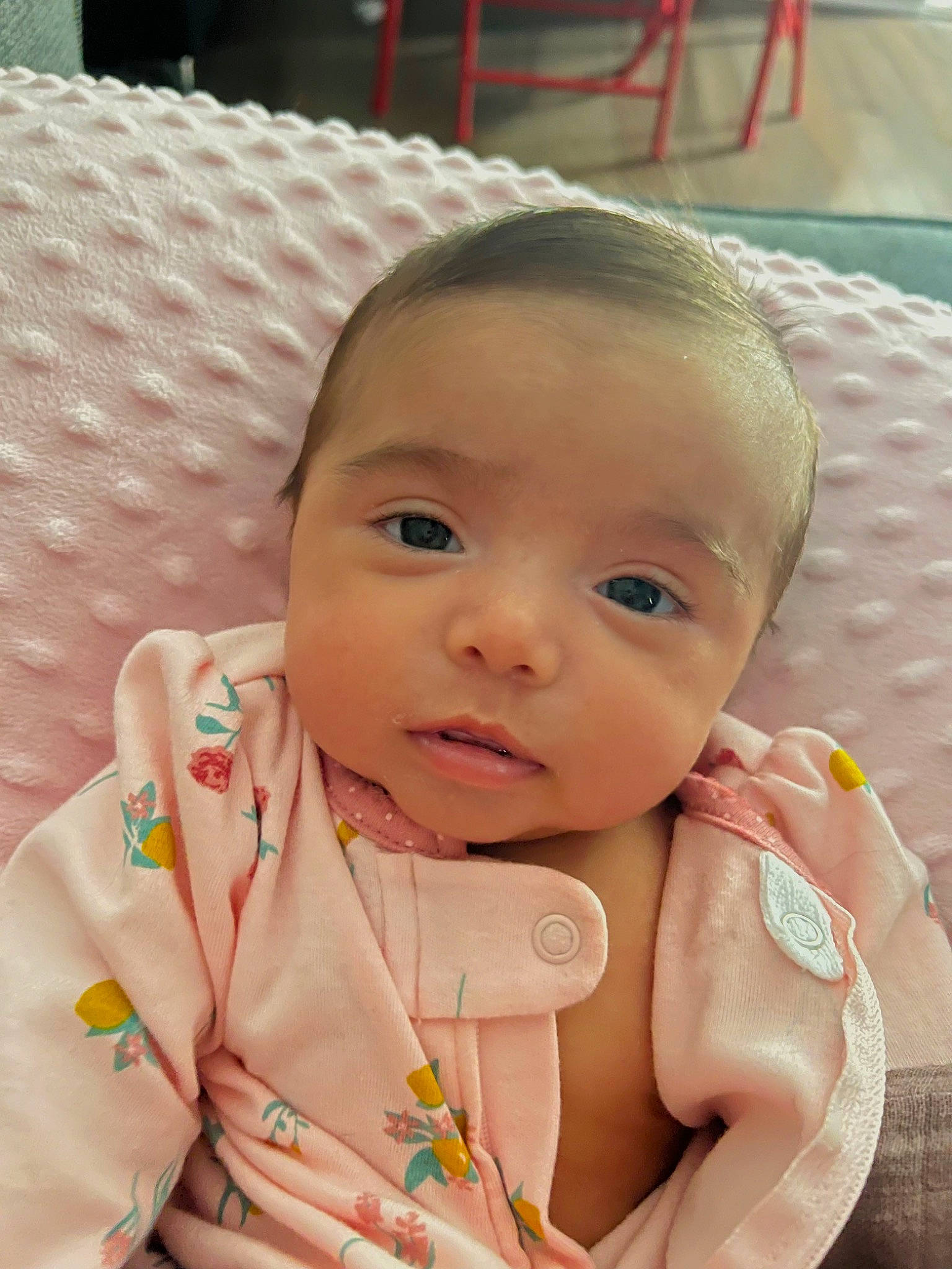 Camila is registered to the contest to win money with this photo: baby, baby_products, baby_toddler_clothing, cheek, child, chin, eyelash, face, facial_expression, fun, happy, linens, lip, nail, nose, person, skin, sleeve, smile, thumb