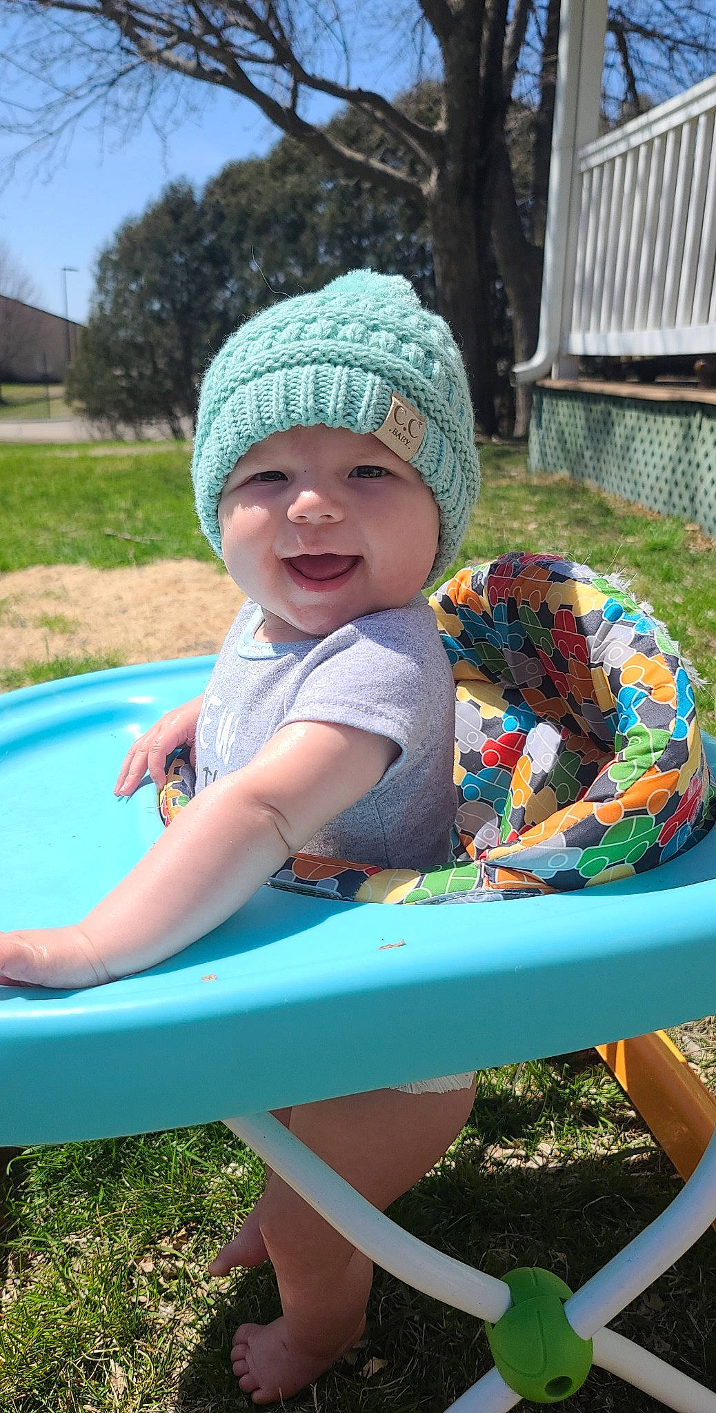 Vivienne joined the competition — help win amazing prizes! baby, baby_toddler_clothing, blue, cap, child, chute, fun, grass, green, happy, headwear, leisure, magenta, outdoor_furniture, person, pink, play, recreation, smile, spring