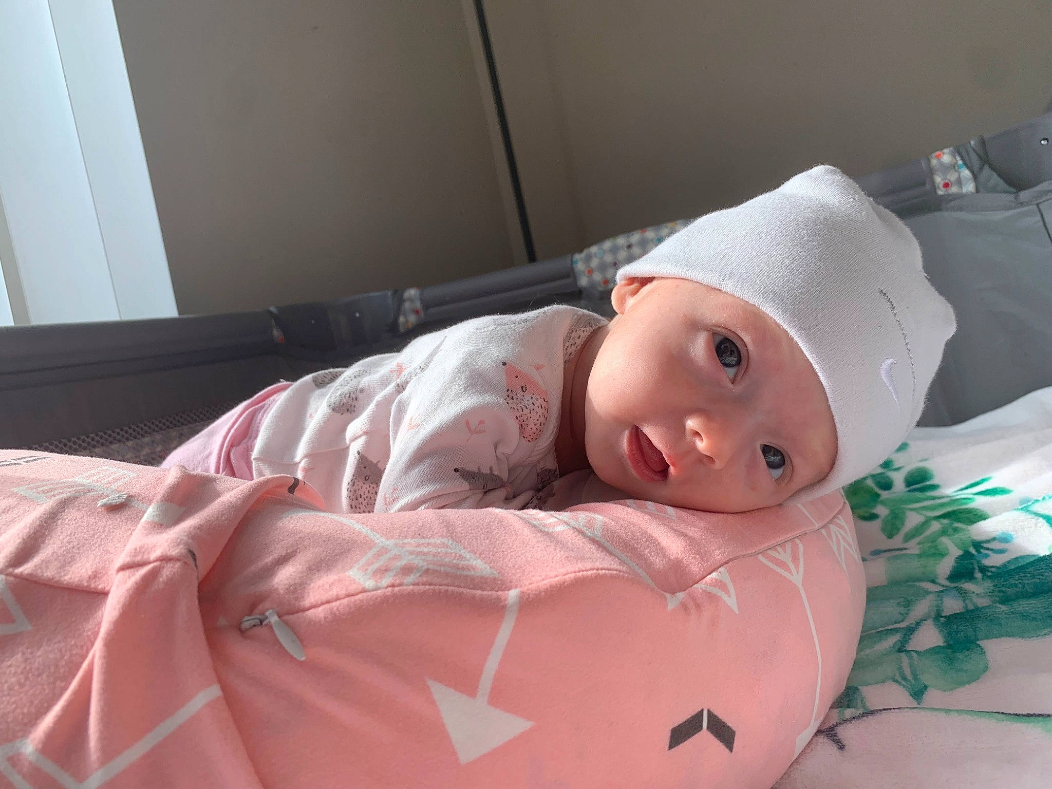 Bailey joined the competition — help win amazing prizes! baby, baby_toddler_clothing, bedding, child, comfort, costume_hat, couch, flesh, happy, hat, head, headwear, linens, magenta, person, pink, room, sitting, smile, toddler