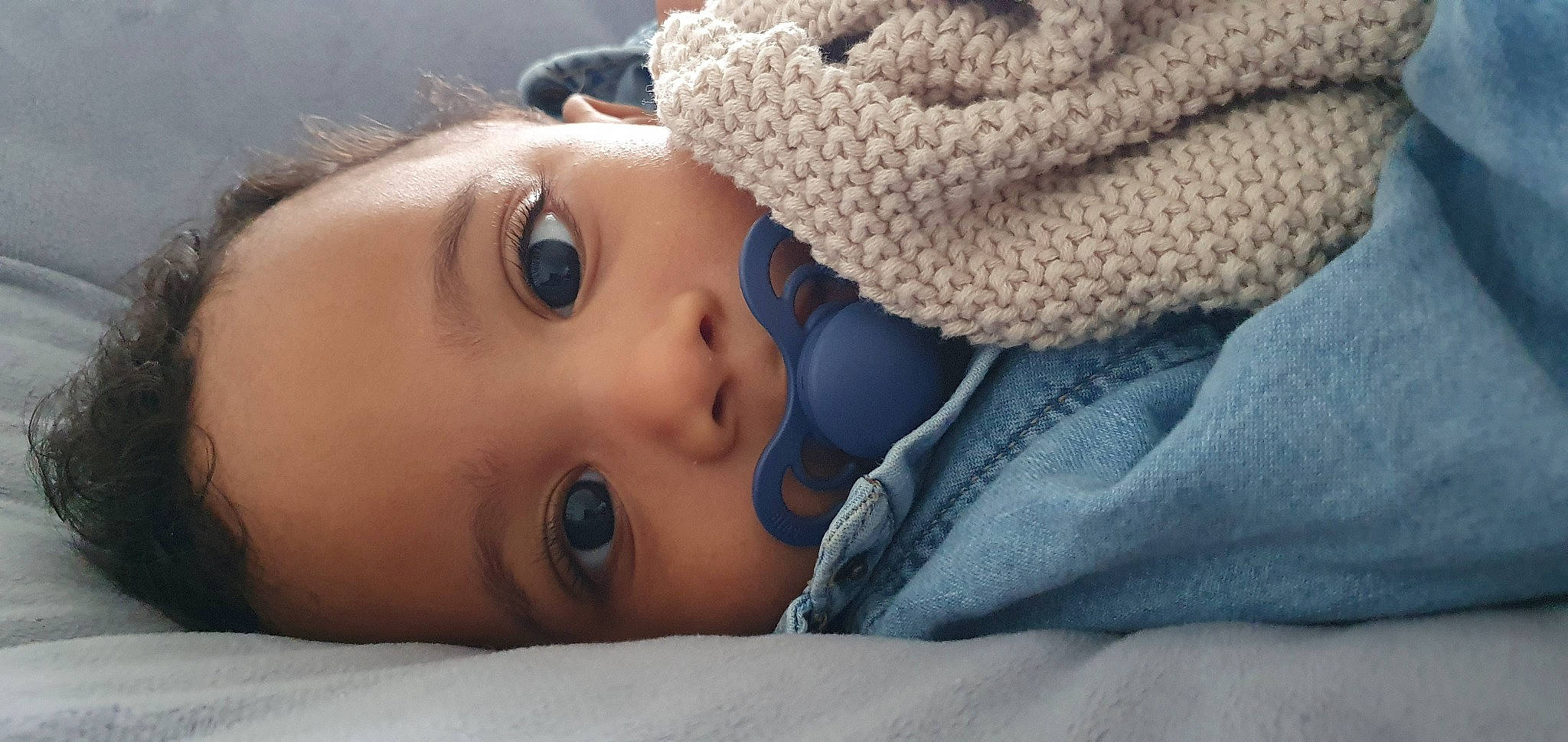 Marley a rejoint le concours — aidez-le/la à gagner de superbes lots ! baby, cap, cheek, child, chin, comfort, eyebrow, eyelash, flash_photography, iris, knit_cap, linens, lip, mouth, nose, person, skin, textile, toddler, tree