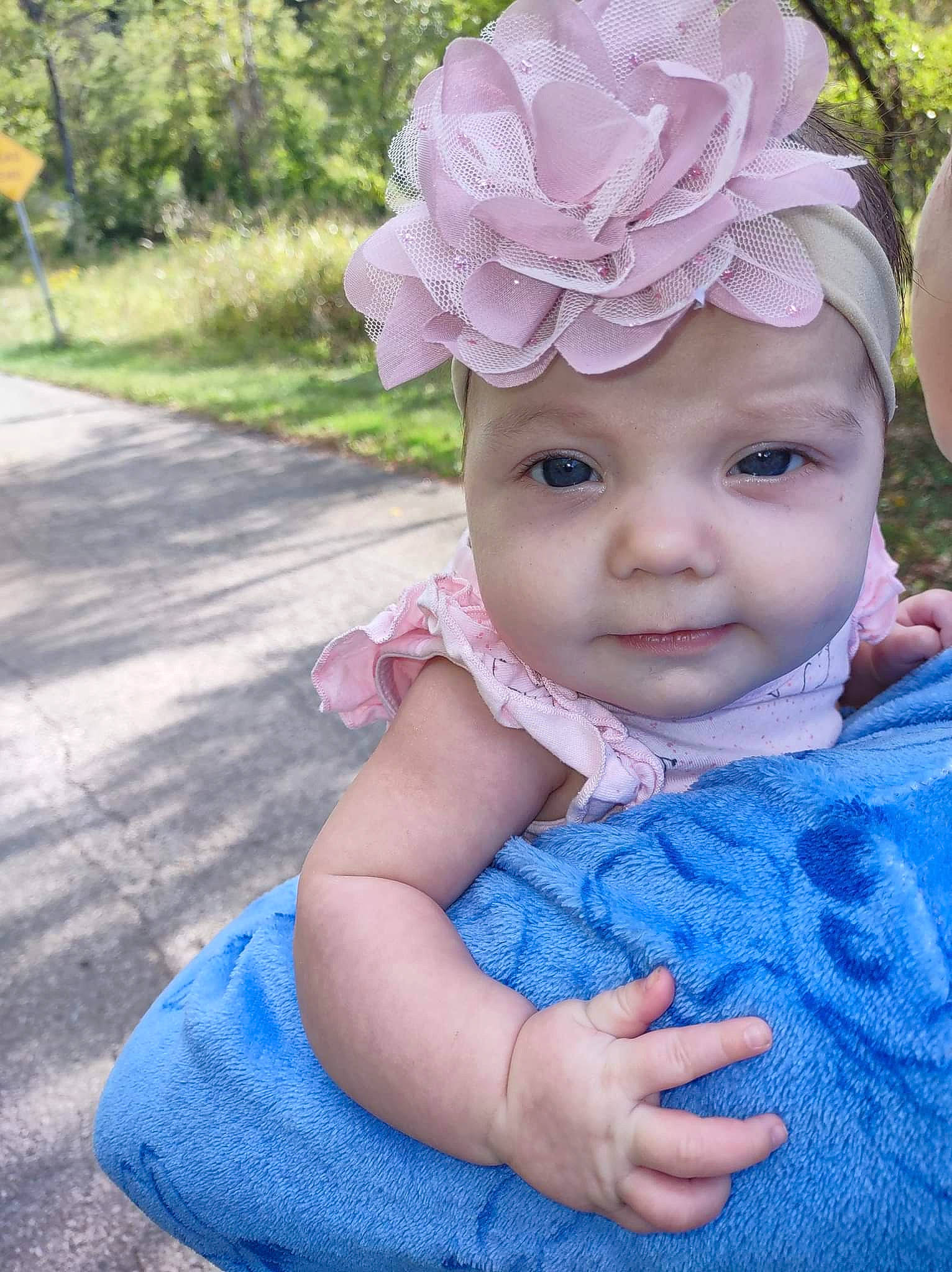 Addalynn joined the competition — help win amazing prizes! baby, baby_toddler_clothing, blue, cap, costume_hat, dress, eye, grass, green, head, headband, headgear, headpiece, headwear, magenta, person, petal, pink, plant, purple