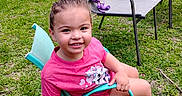 Alexia joined the competition — help win amazing prizes! backyard, chair, child, fun, girl, grass, happy, nature, outdoor, person, pink_shirt, play, plush, sandals, slide, smiling, stick, summer, toy, unicorn