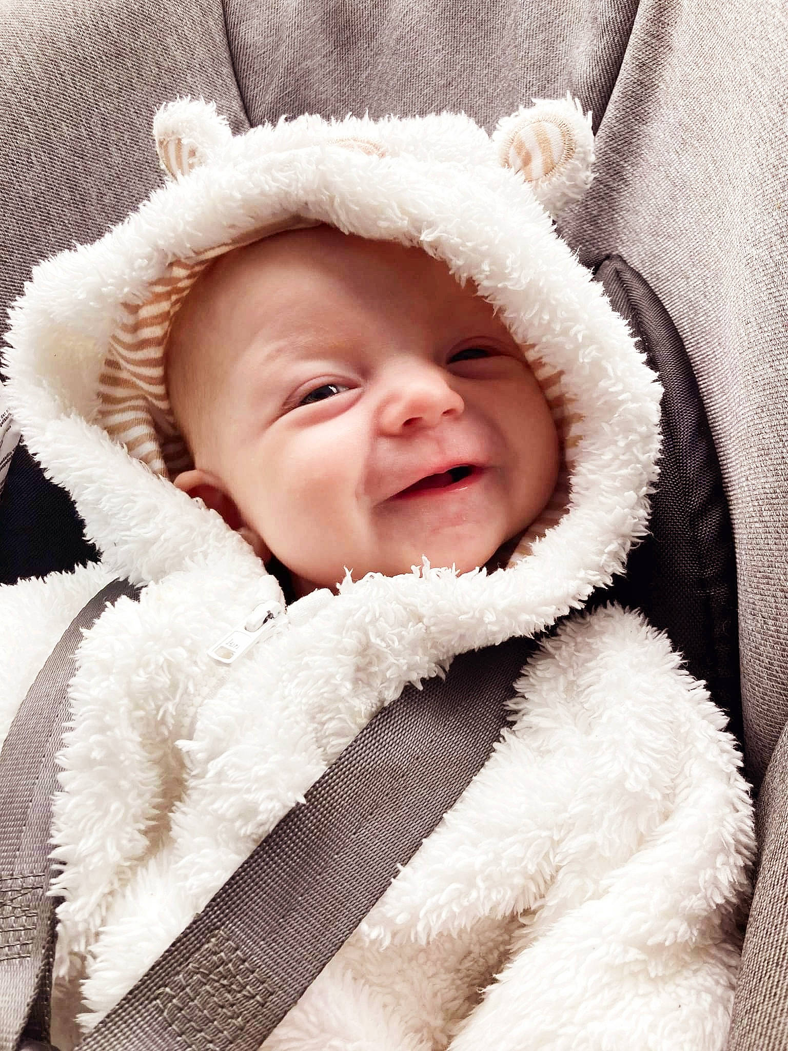 Quinn joined the competition — help win amazing prizes! baby, cheek, child, close_up, comfort, eye, fashion_accessory, flash_photography, fur, fur_clothing, happy, head, headwear, iris, lip, parka, person, portrait_photography, smile, toddler