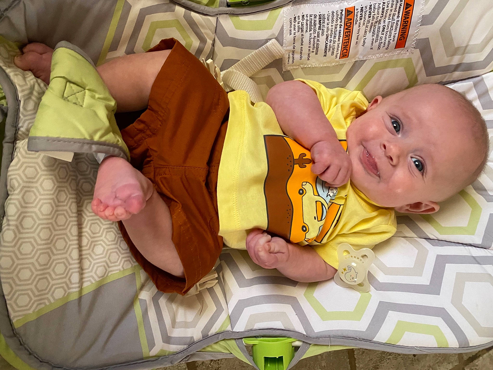 Maxwell is registered to the contest to win money with this photo: baby, baby_products, baby_safety, baby_toddler_clothing, baby_toys, cheek, child, comfort, fun, happy, linens, person, product, room, sitting, smile, textile, toddler