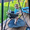 Drew joined the competition — help win amazing prizes! baby, child, swing, blue_shirt, deck, wooden_floor, person, grass, lawn, trees, outdoor, toy, play, daylight, firepit, pillow, trampoline, curious, summer, backyard