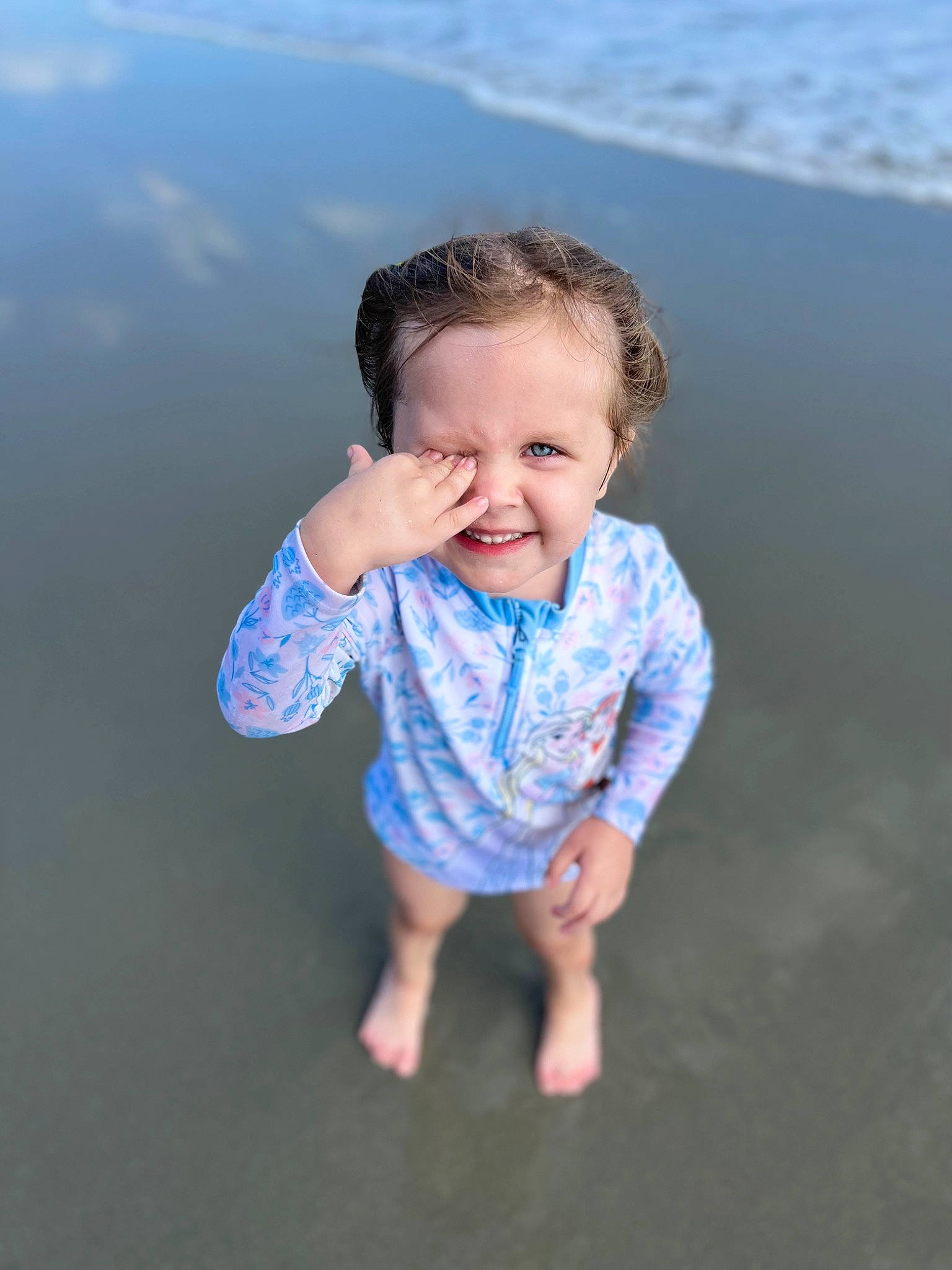 Paisley joined the competition — help win amazing prizes! azure, baby, baby_toddler_clothing, beauty, electric_blue, flash_photography, fun, grass, happy, horizon, leisure, people_in_nature, person, sand, sky, sleeve, smile, standing, summer, t_shirt