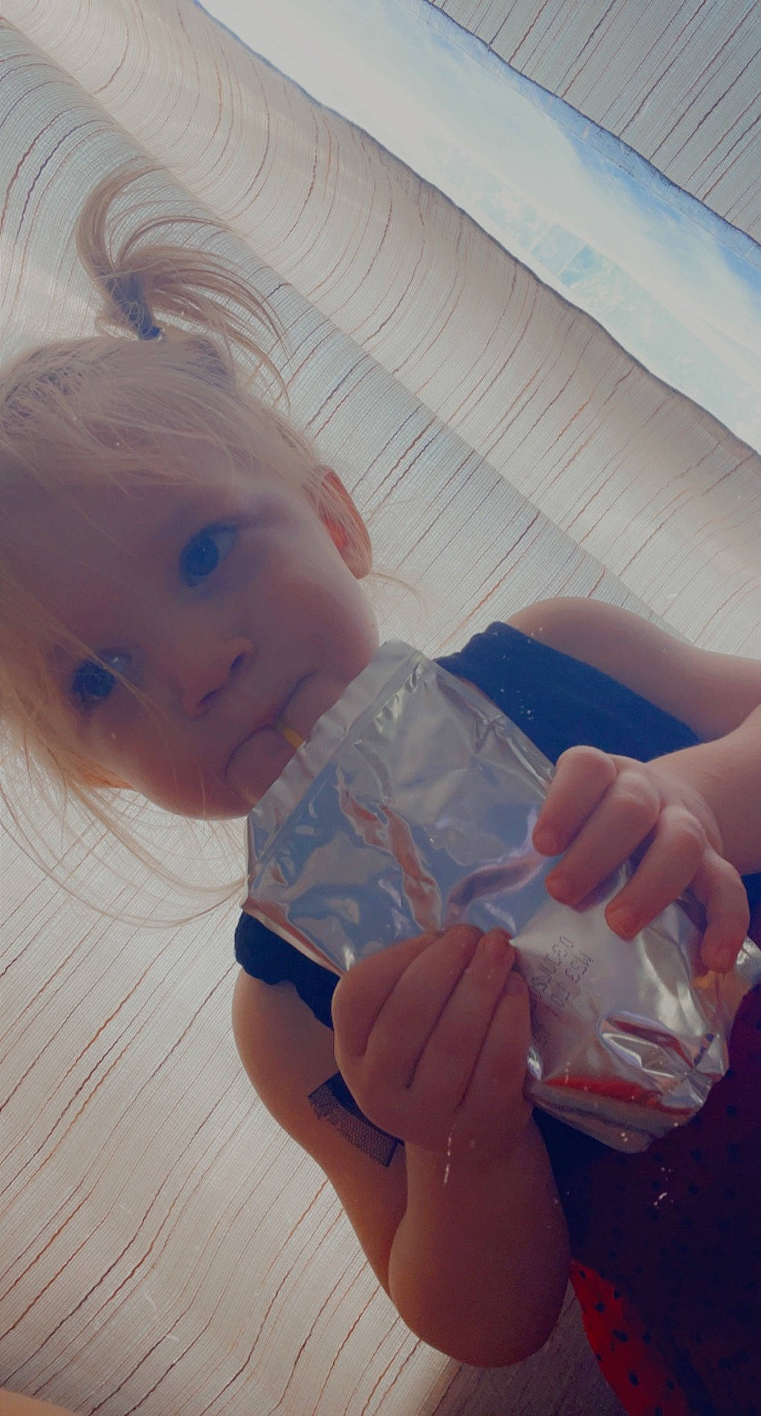 Addisyn is registered to the contest to win money with this photo: arm, baby, baby_toddler_clothing, cheek, child, cloud, comfort, finger, fun, gesture, hand, happy, human, mouth, muscle, nose, person, skin, smile, thumb