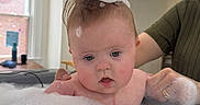 Truman joined the competition — help win amazing prizes! adult, baby, bath, bathroom, bubble_bath, child, facial_expression, foam, hair, hand, indoor, light, person, room, skin, soap_bubbles, support, tub, water, window