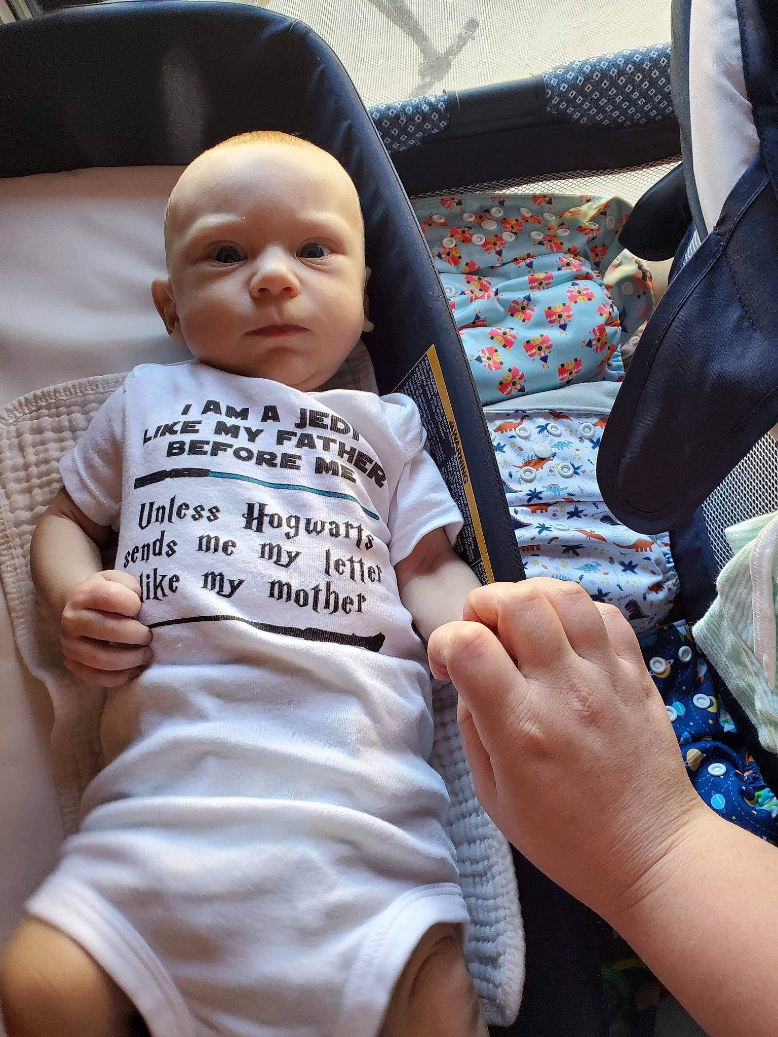 Richard joined the competition — help win amazing prizes! baby, baby_carriage, baby_products, baby_safety, baby_toddler_clothing, car_seat, cheek, child, comfort, finger, fun, gesture, happy, linens, nail, people, person, sitting, sleeve, thumb