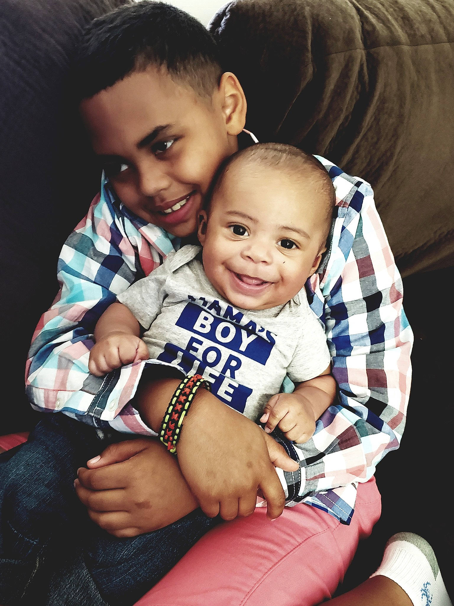 Joziah joined the competition — help win amazing prizes! baby_toddler_clothing, cheek, child, comfort, ear, eye, finger, hand, happy, joy, lap, laugh, love, nail, nose, person, sitting, sock, thigh, thumb