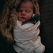 Waylon joined the competition — help win amazing prizes! baby, sleeping, swaddled, blanket, cushion, soft, infant, peaceful, face, head, newborn, cozy, wrapped, child, portrait, indoor, warm, resting, cute, comfort