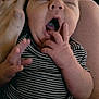 Waylon joined the competition — help win amazing prizes! baby, infant, yawning, striped_clothing, hands, closeup, sleepy, person, cute, newborn, human, skin, face, mouth, fingers, resting, comfort, indoor, portrait, toddler