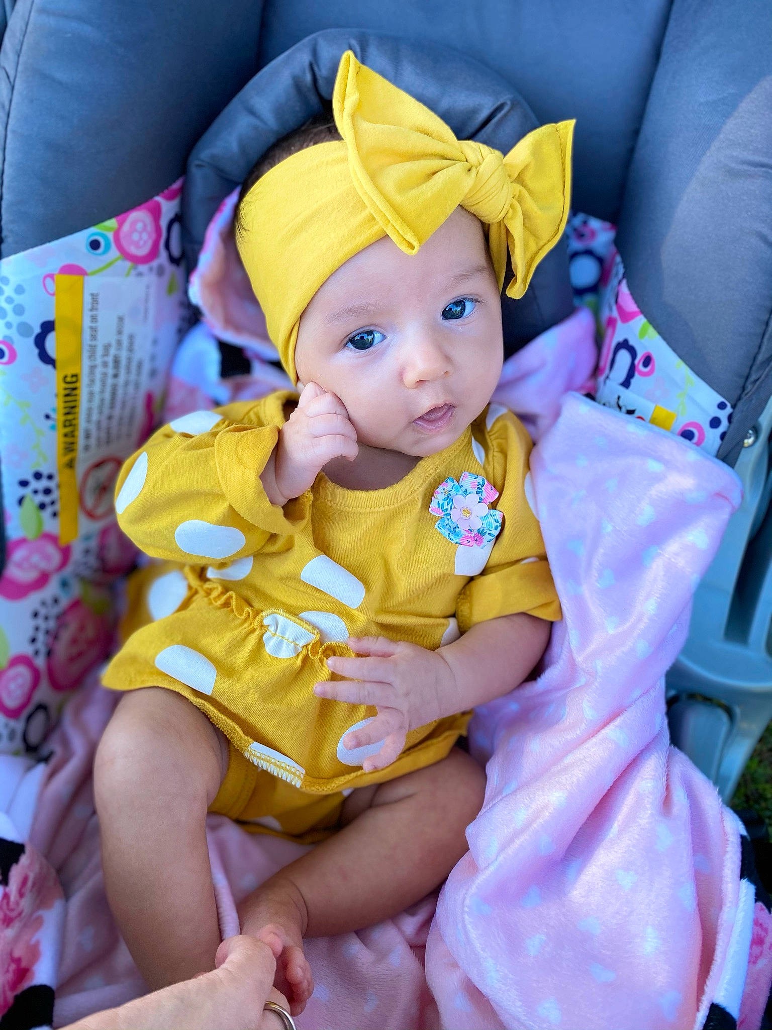 Valentina is registered to the contest to win money with this photo: baby_products, baby_toddler_clothing, blue, child, comfort, fun, happy, hat, head, headwear, lap, linens, magenta, person, pink, purple, sitting, stuffed_toy, thigh, toddler