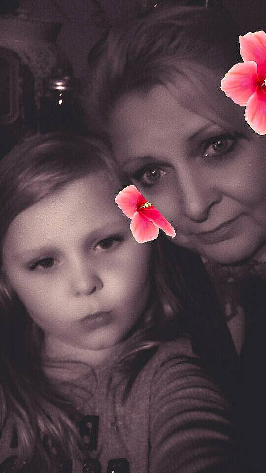 Adeline is registered to the contest to win money with this photo: beauty, cheek, child, colorfulness, ear, eye, face, flower, head, lip, mouth, nose, person, petal, photography, pink, plant, red, selfie, skin