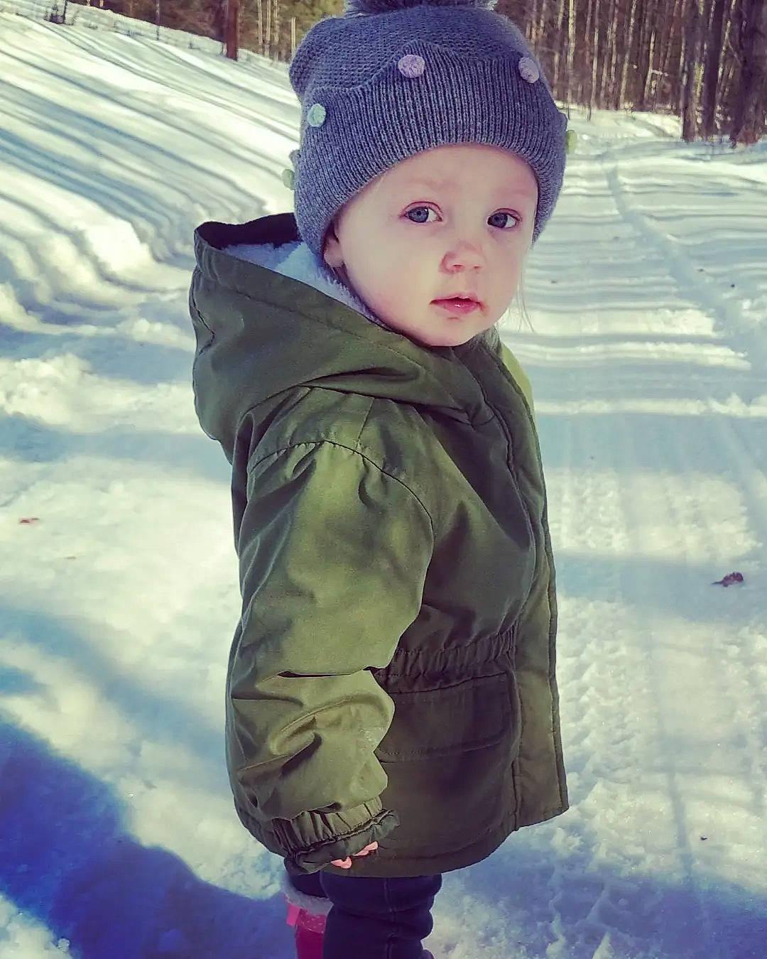 Maggie is registered to the contest to win money with this photo: beauty, cap, child, cool, face, freezing, happy, head, headgear, headwear, jacket, knit_cap, person, photograph, plant, sleeve, snapshot, snow, tints_and_shades, toddler