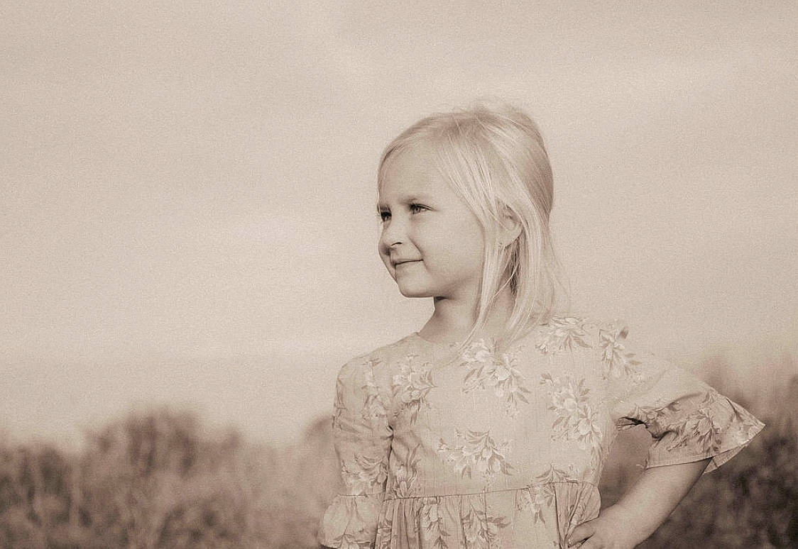 Tegan joined the competition — help win amazing prizes! beauty, black_and_white, blond, child, dress, eye, face, facial_expression, hair, hairstyle, head, joy, monochrome, monochrome_photography, people, person, photograph, photography, smile, snapshot