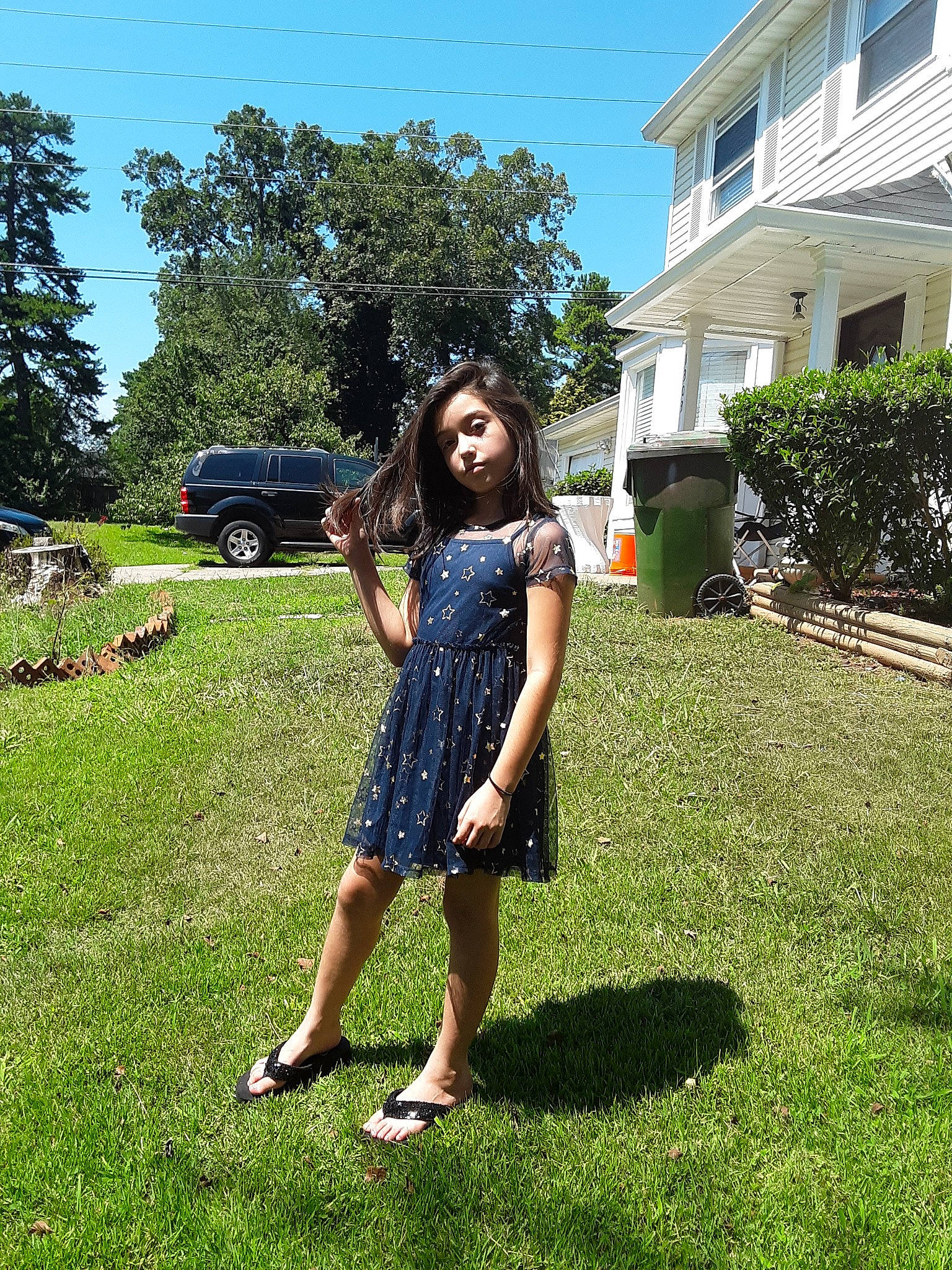 Jennifer joined the competition — help win amazing prizes! black_hair, dress, fashion, footwear, fun, garden, grass, grass_family, house, lawn, leg, long_hair, person, photography, plant, recreation, shoe, summer, vacation, yard