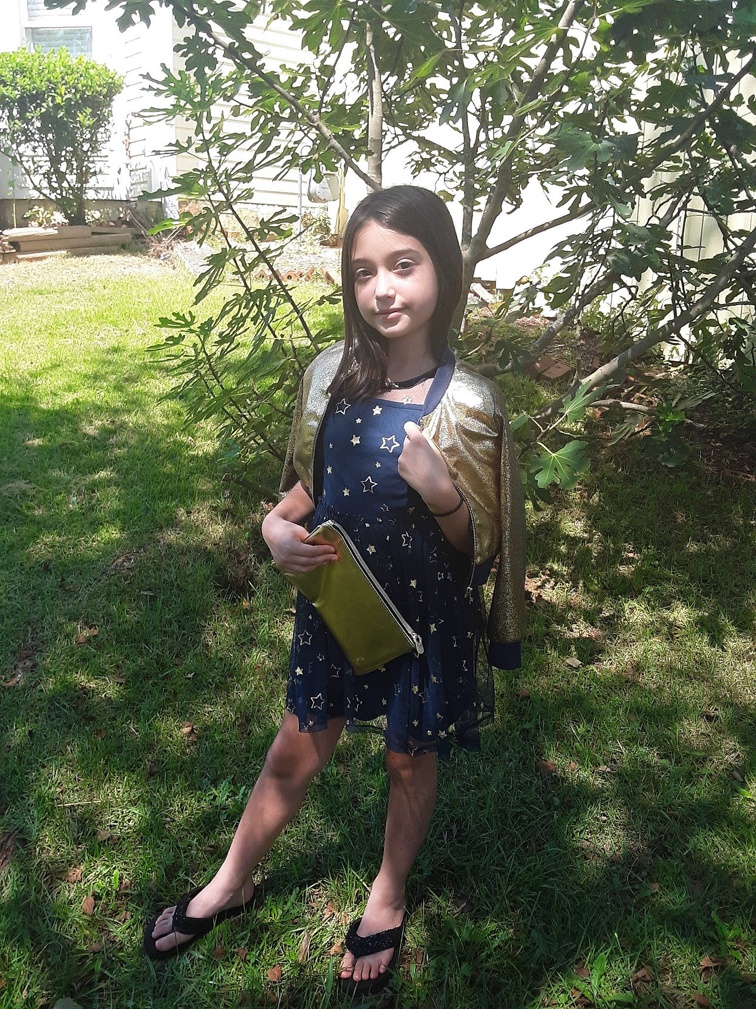 Jennifer is registered to the contest to win money with this photo: botany, dress, fawn, fun, grass, happy, person, photography, plant, smile, summer, tree, trunk