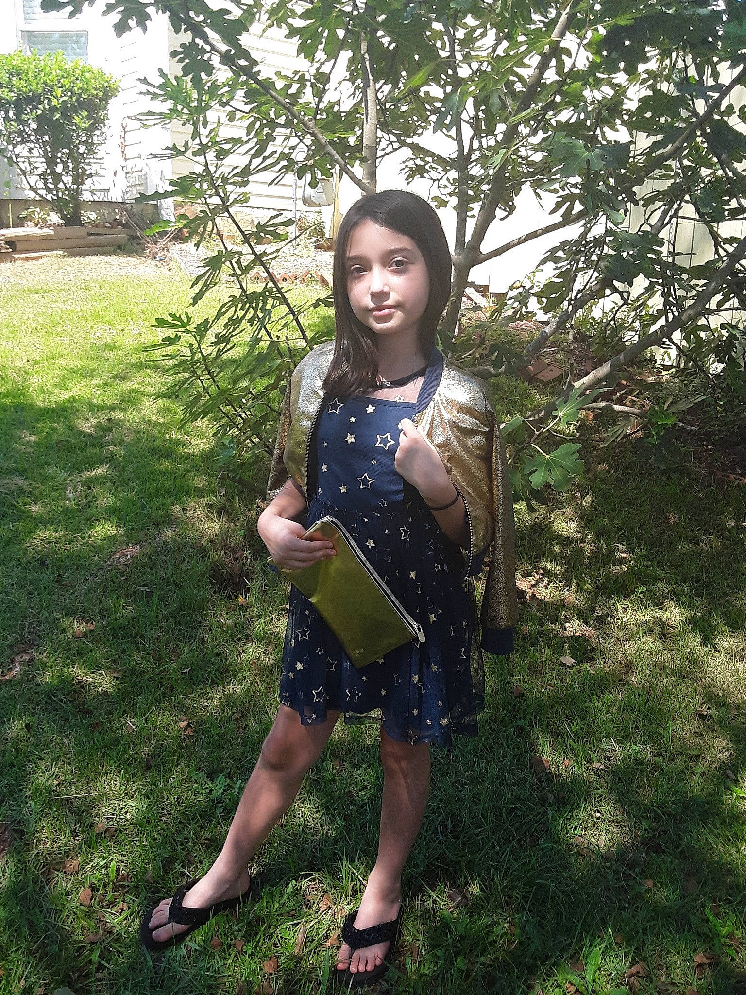 Jennifer is registered to the contest to win money with this photo: botany, dress, fawn, fun, grass, happy, person, photography, plant, smile, summer, tree, vacation