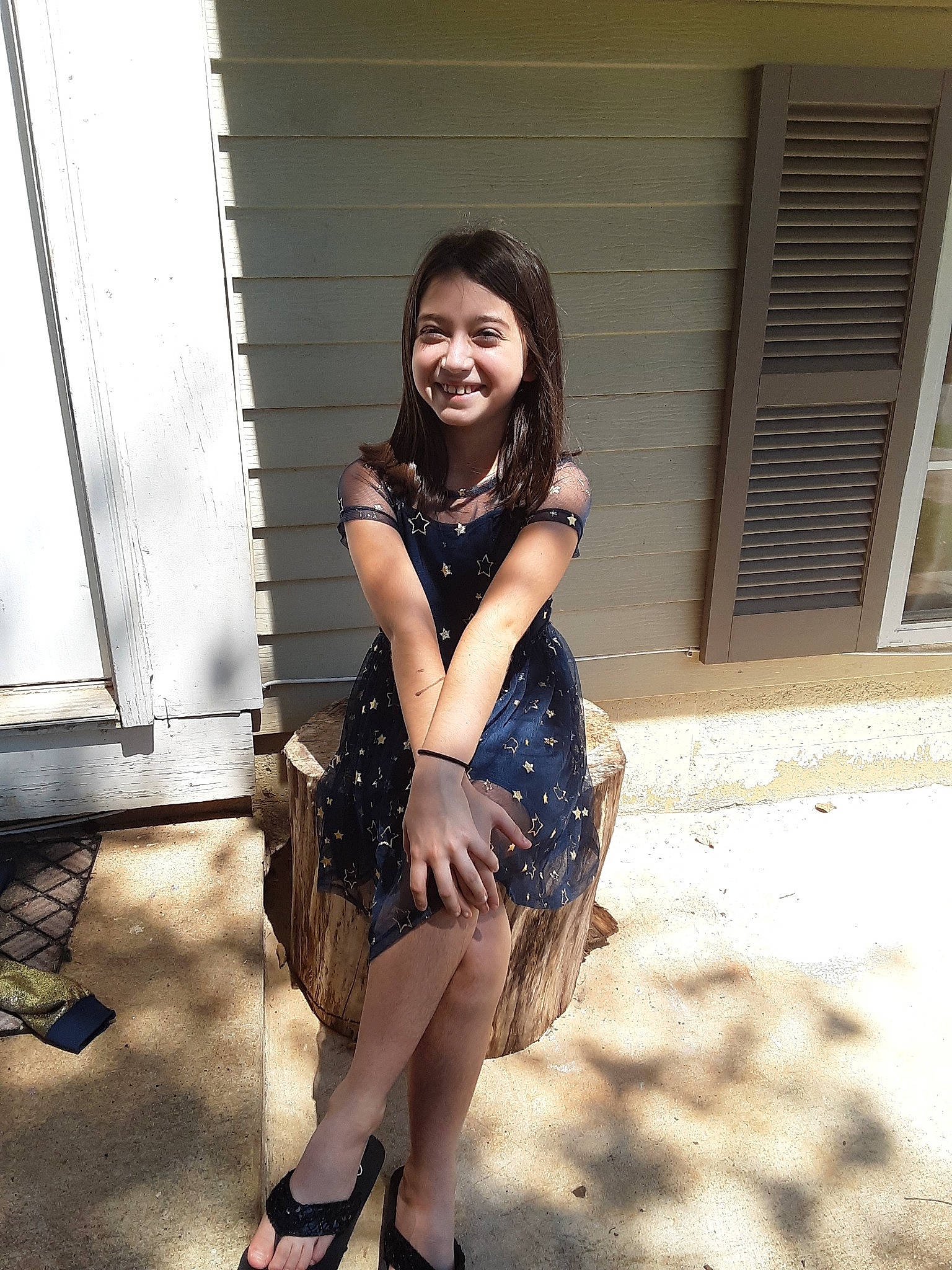 Jennifer is registered to the contest to win money with this photo: beauty, black_hair, brown_hair, dress, facial_expression, fashion, fawn, footwear, happy, joy, lady, leg, long_hair, person, photo_shoot, shoe, sitting, skin, smile, snapshot