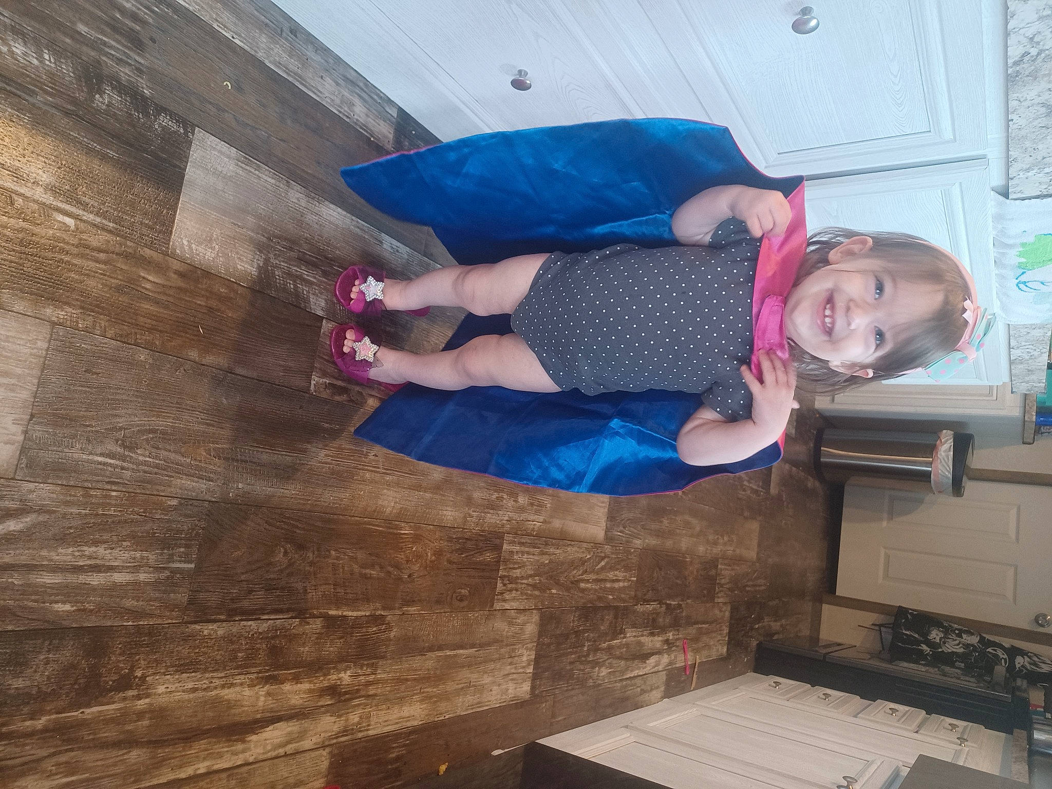 Sophia joined the competition — help win amazing prizes! brickwork, child, concrete, dress, electric_blue, flooring, fun, hardwood, human_leg, joy, magenta, pattern, person, purple, room, sitting, t_shirt, thigh, visual_arts, wood