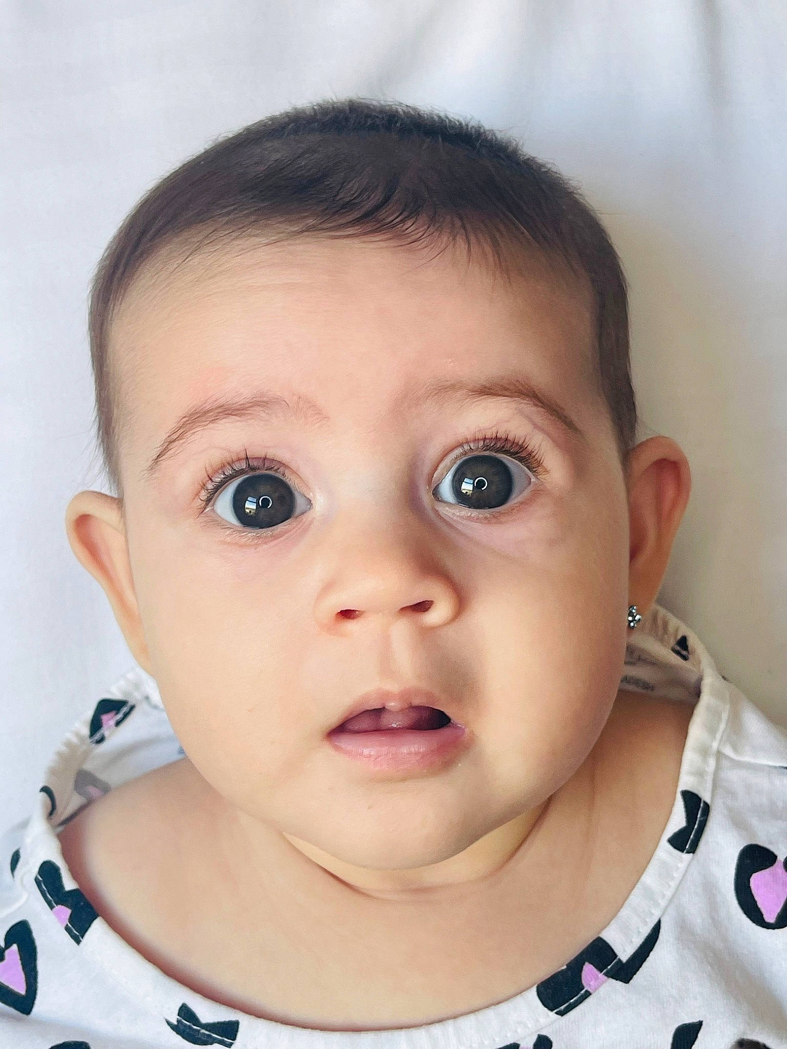 Melania joined the competition — help win amazing prizes! baby, baby_toddler_clothing, cheek, chin, ear, eyebrow, eyelash, face, flash_photography, hairstyle, happy, iris, jaw, lip, mouth, neck, nose, person, skin, sleeve