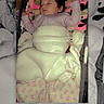 Izabelle joined the competition — help win amazing prizes! baby, baby_bed, bedding, blanket, closed_eyes, cozy, crib, face, indoor, infant, layered_image, nap, peaceful, photograph, pink_clothing, plush_toy, portrait, resting, sleeping, swaddled