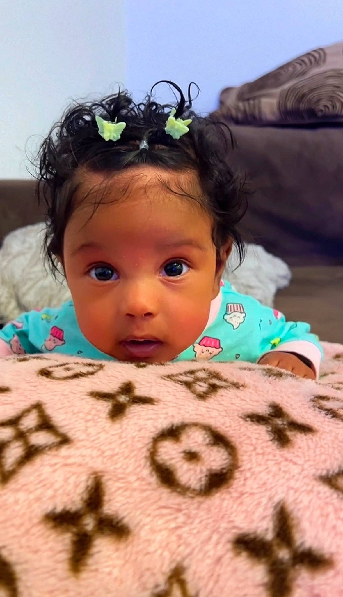 Mila joined the competition — help win amazing prizes! baby, baby_toddler_clothing, black_hair, cheek, child, chin, comfort, eye, eyebrow, eyelash, face, facial_expression, grass, happy, head, iris, nose, person, pink, skin