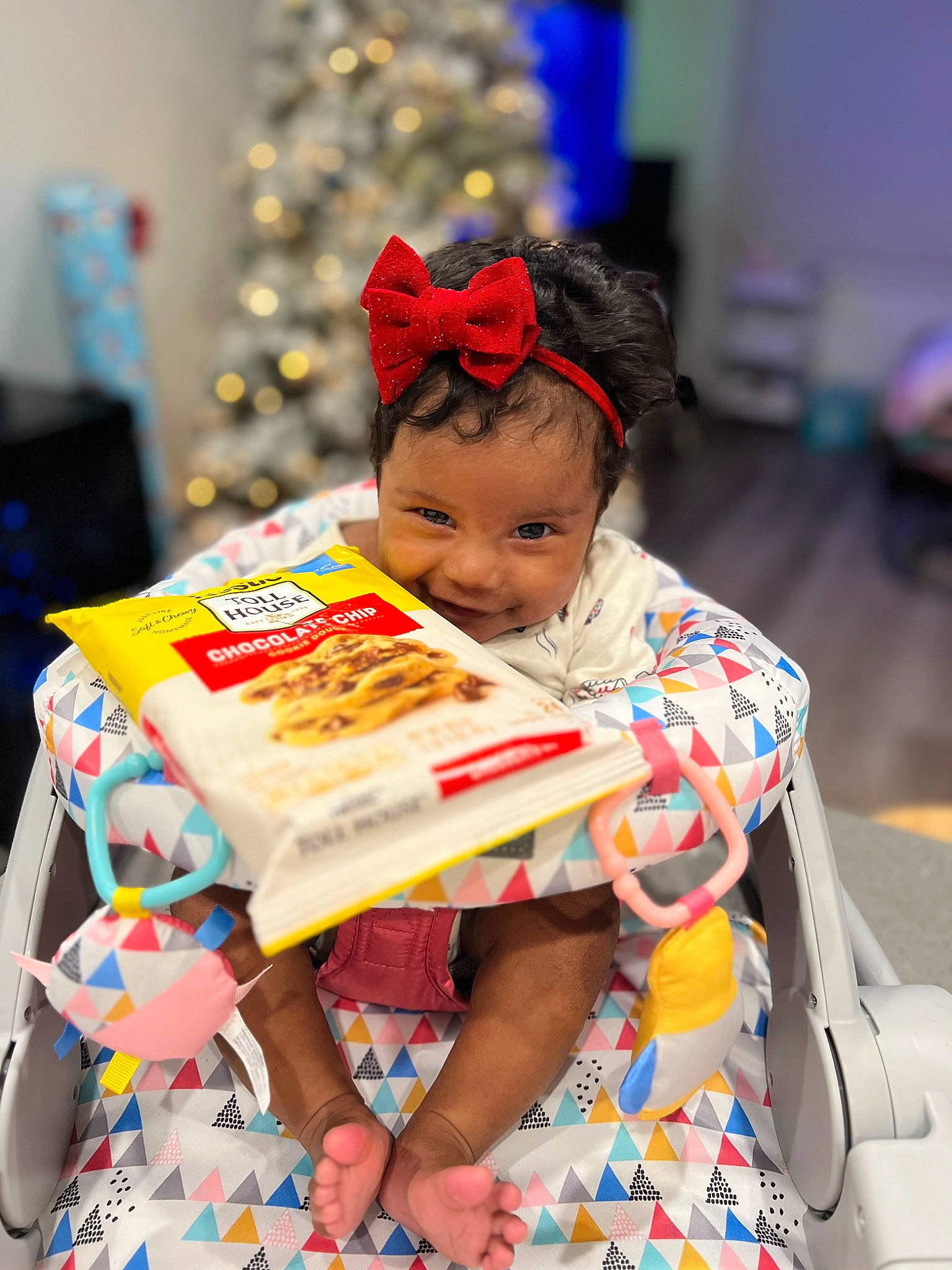 Mila joined the competition — help win amazing prizes! box, child, christmas, christmas_decoration, christmas_tree, event, fun, happy, holiday, leisure, party, party_supply, person, play, reading, room, sitting, sweetness, toddler, tradition