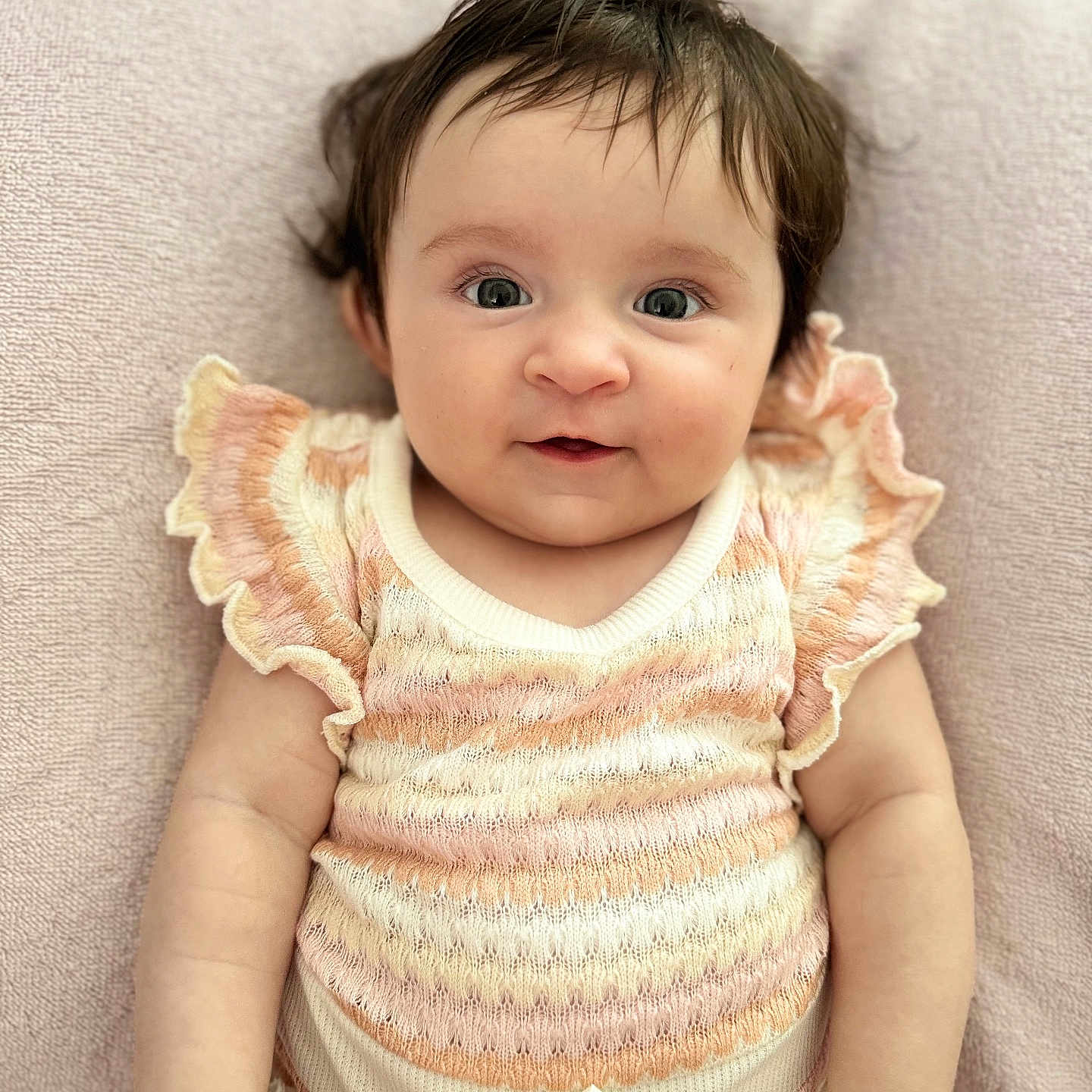Olivia joined the competition — help win amazing prizes! baby, blanket, bow, child, chubby_arms, cute, eyes, face, happy, indoors, infant, knitwear, lying_down, pastel_colors, pink, portrait, ruffled_sleeves, smile, soft_texture, young_child