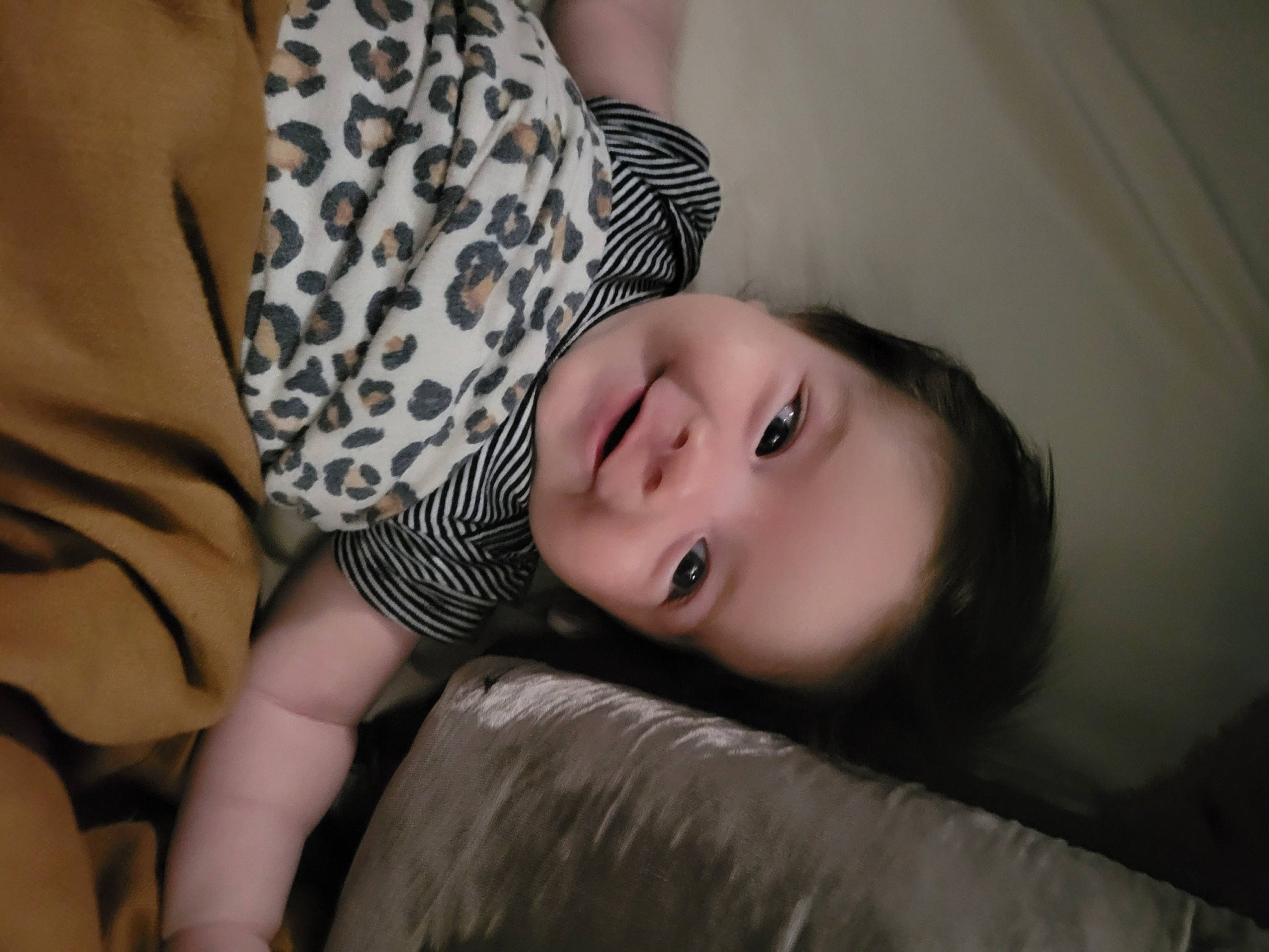 Sarah is registered to the contest to win money with this photo: child, comfort, couch, elbow, facial_expression, flash_photography, grass, happy, human_leg, joy, lip, monochrome, monochrome_photography, pattern, person, portrait_photography, sitting, skin, smile, toddler