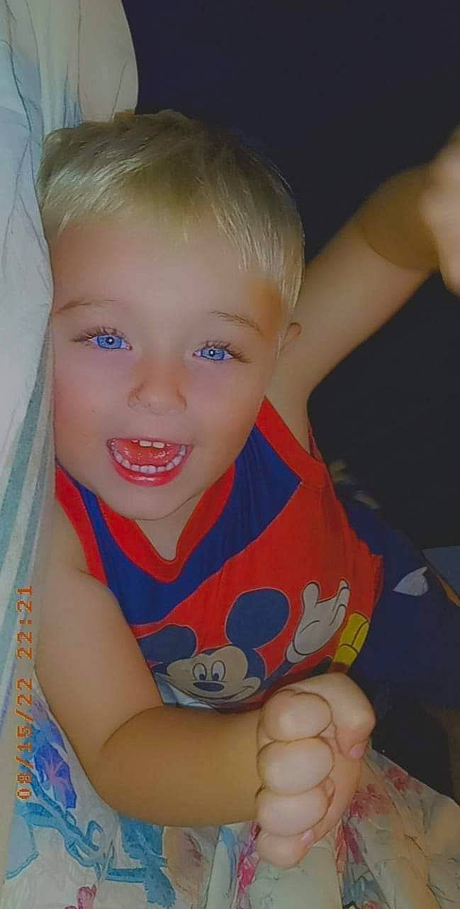 Logan joined the competition — help win amazing prizes! arm, baby_toddler_clothing, cheek, chin, eye, facial_expression, finger, gesture, hairstyle, hand, happy, human_body, iris, leg, mouth, nose, person, skin, smile, standing