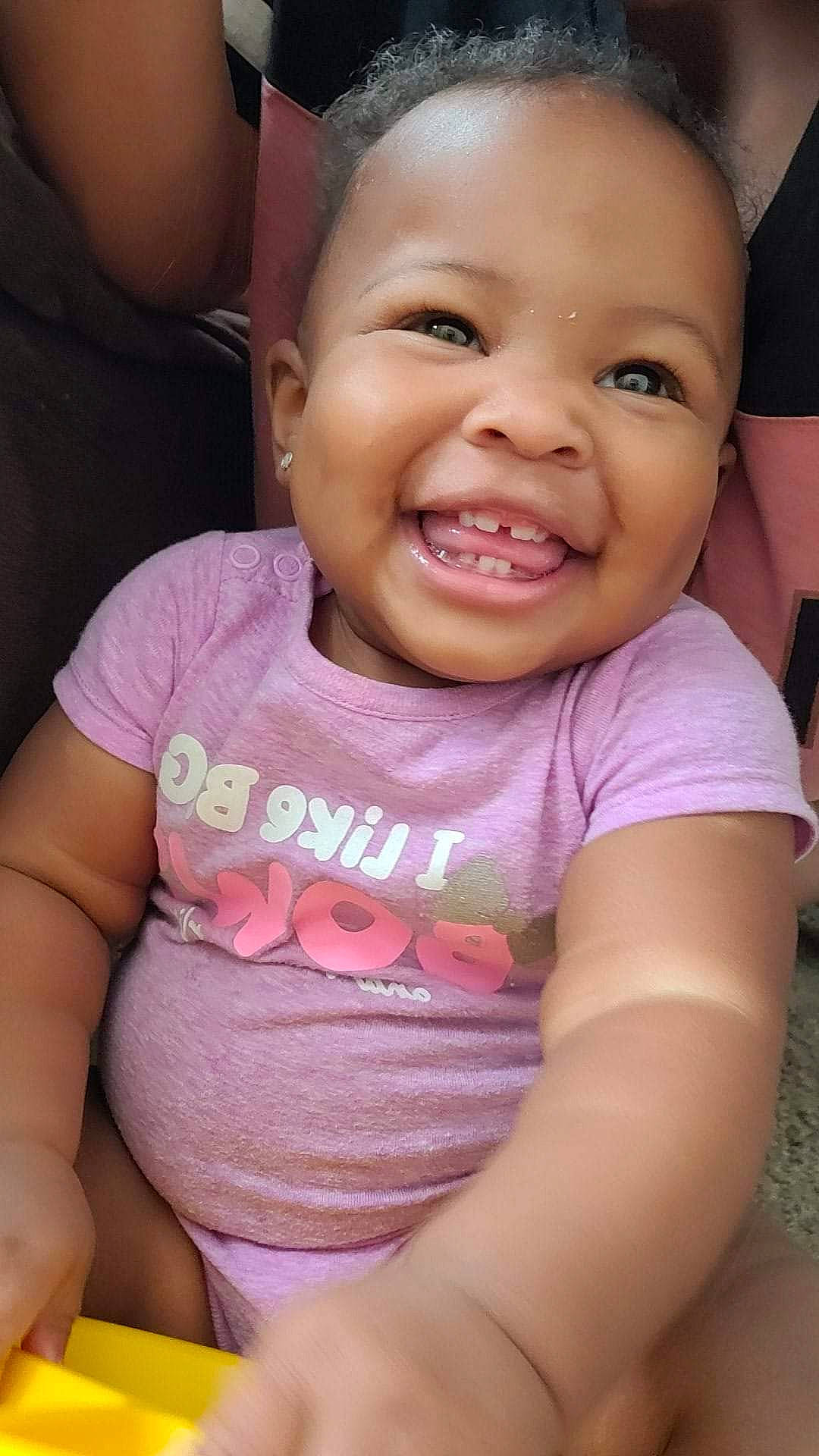 Semariah is registered to the contest to win money with this photo: baby_toddler_clothing, cheek, child, ear, eye, eyebrow, eyelash, facial_expression, forehead, happy, iris, joy, lip, mouth, nose, organ, person, pink, skin, toddler