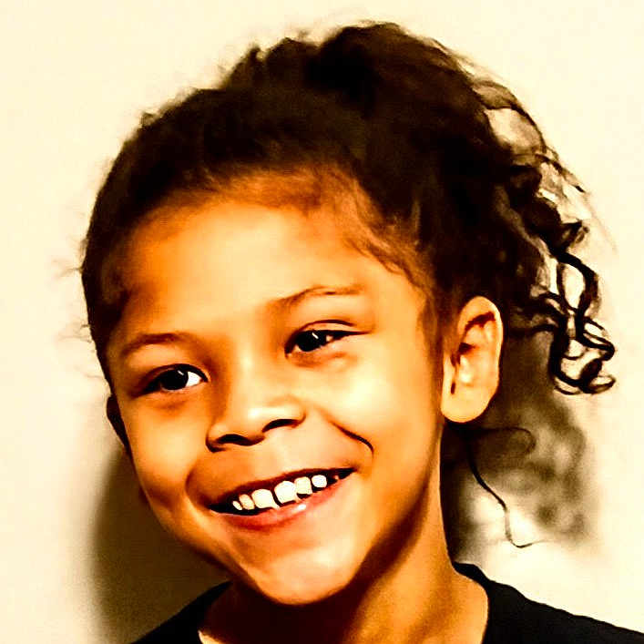 Khiyyon joined the competition — help win amazing prizes! black_shirt, casual, child, closeup, curly_hair, cute, expression, face, friendly, hair_tied_back, happy, head, indoor, joy, person, portrait, skin, smiling, teeth, young