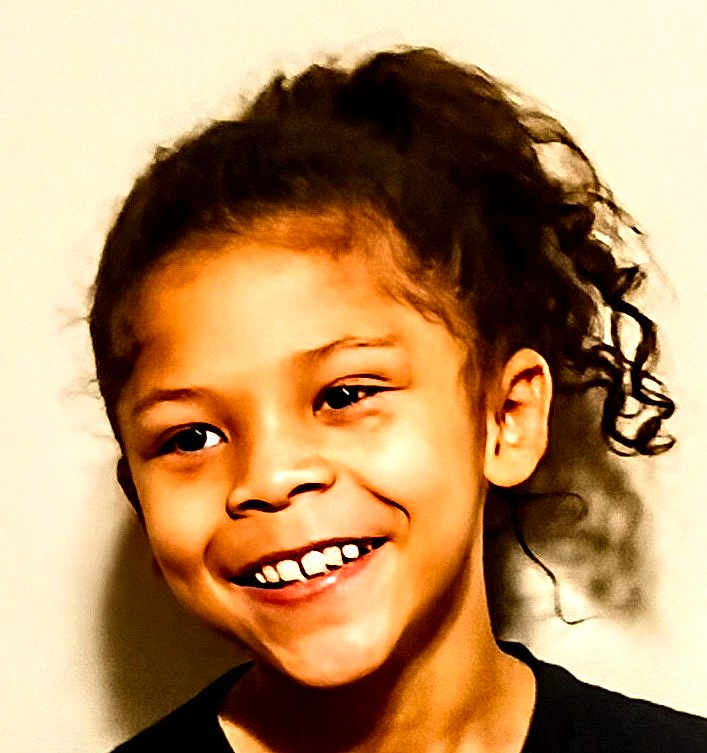 Khiyyon joined the competition — help win amazing prizes! child, smiling, face, curly_hair, portrait, happy, person, young, head, expression, casual, indoor, black_shirt, closeup, skin, teeth, joy, cute, friendly, hair_tied_back