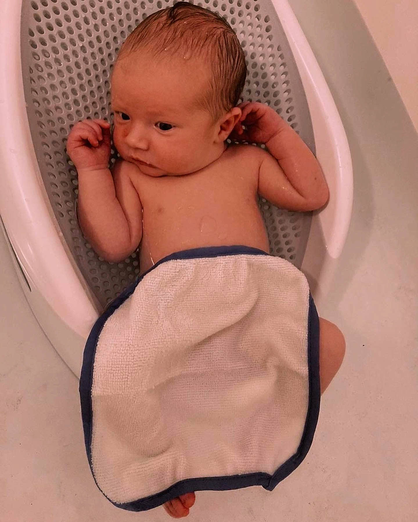 Abel is registered to the contest to win money with this photo: abdomen, baby, baby_toddler_clothing, bathing, cheek, chest, comfort, elbow, foot, hairstyle, mouth, organ, person, pink, plumbing_fixture, skin, stomach, thigh, thumb, toddler