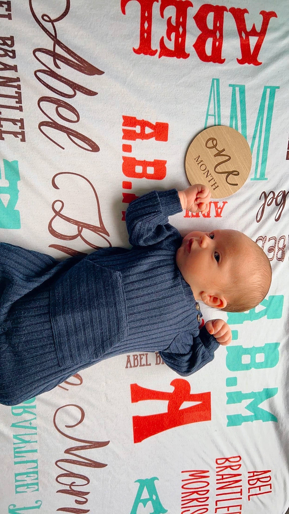 Abel is registered to the contest to win money with this photo: baby, baby_products, baby_safety, baby_sleeping, baby_toddler_clothing, carmine, child, comfort, font, happy, linens, pattern, person, sleeve, textile, toddler