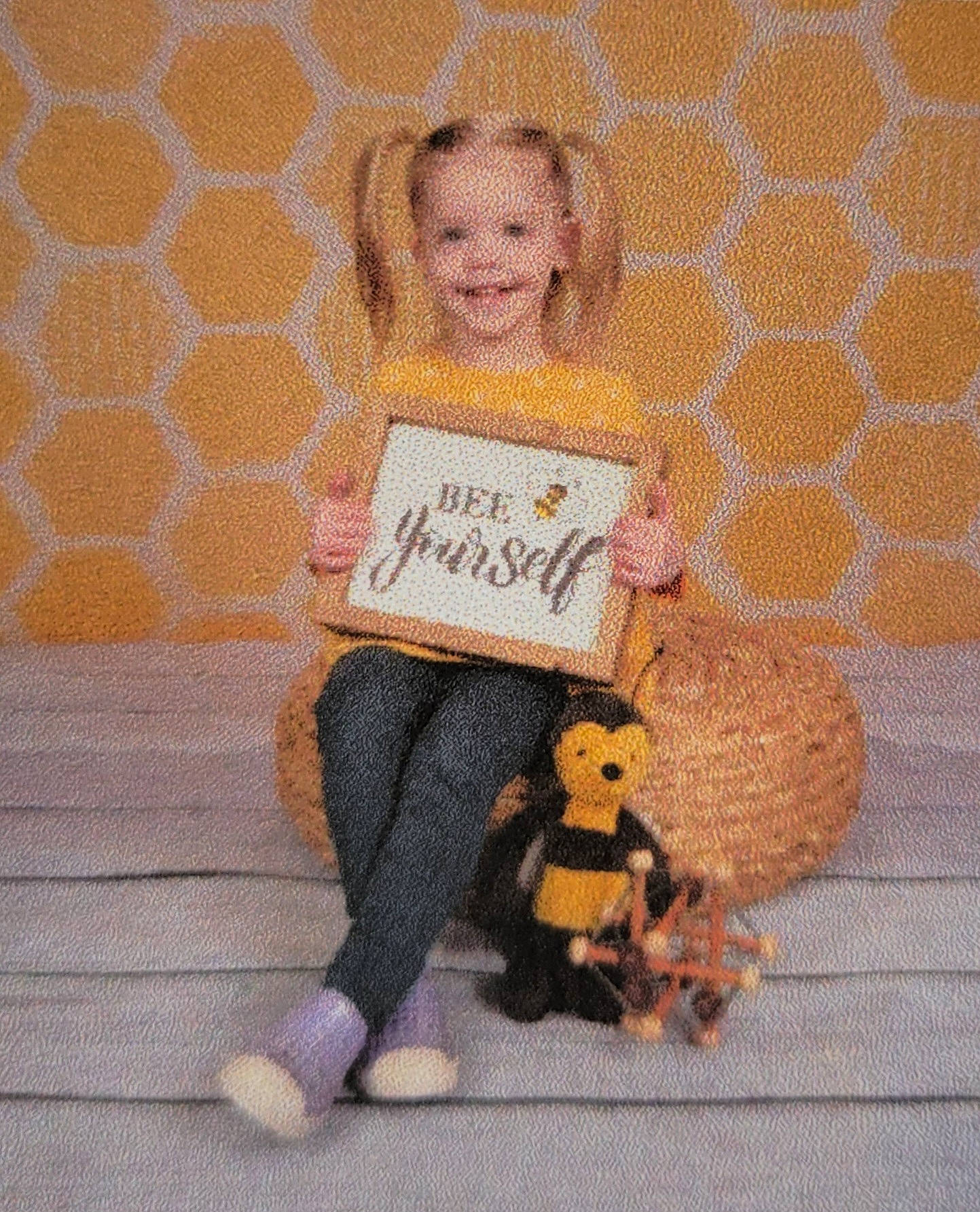 Viviana is registered to the contest to win money with this photo: art, baby, baby_toddler_clothing, child, companion_dog, face, flooring, font, hair, happy, head, joy, pattern, person, sitting, smile, t_shirt, teddy_bear, textile, toddler