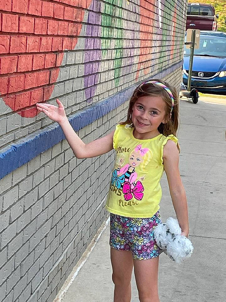 Lyla joined the competition — help win amazing prizes! asphalt, beauty, blue, brick, brickwork, car, electric_blue, eye, fun, hair, happy, joy, person, pink, road_surface, smile, snapshot, summer, thigh, tire