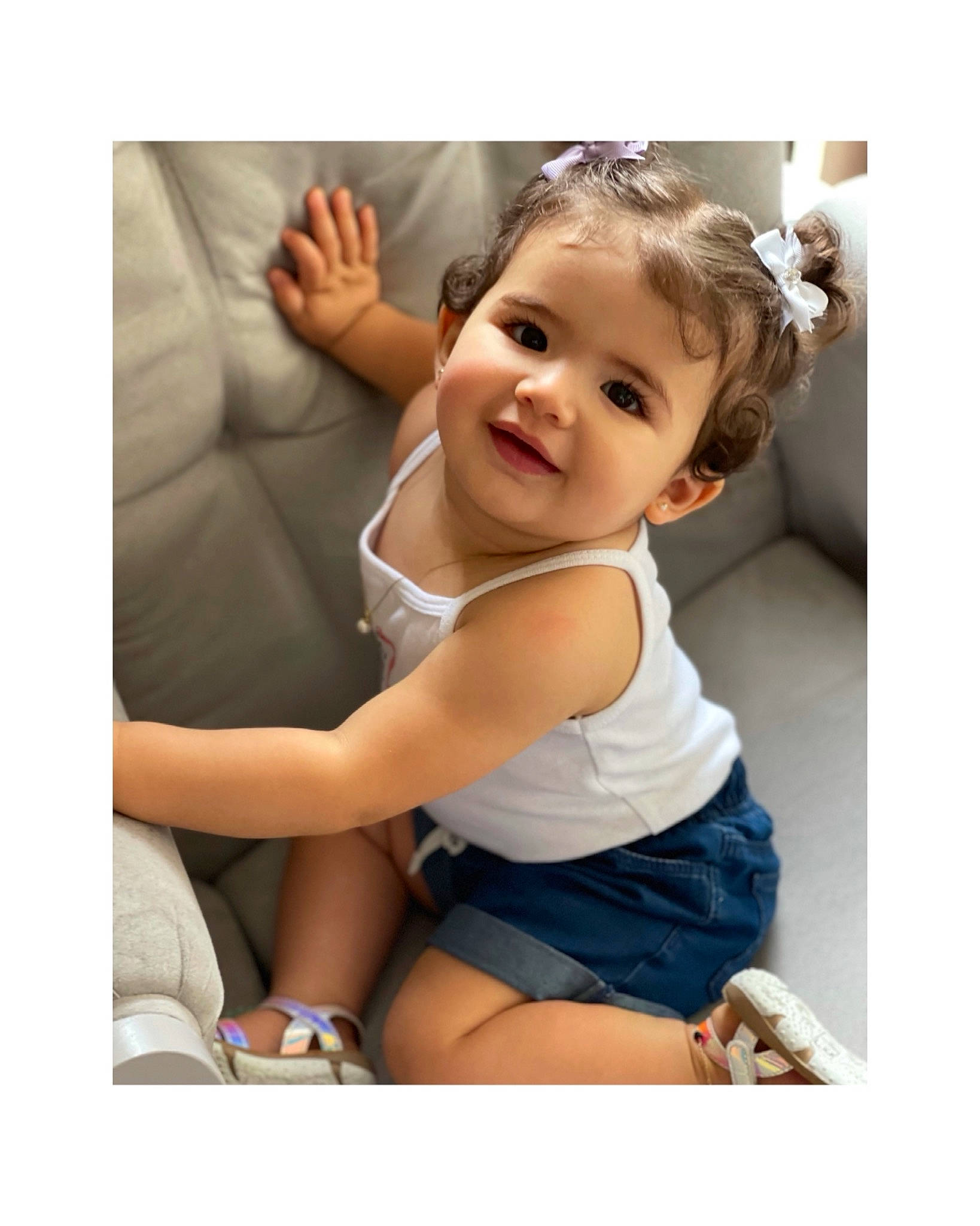 Gaby is registered to the contest to win money with this photo: arm, baby, baby_toddler_clothing, dress, eye, face, finger, gesture, hair, happy, human_body, joy, leg, person, product, shorts, skin, sleeve, smile, textile