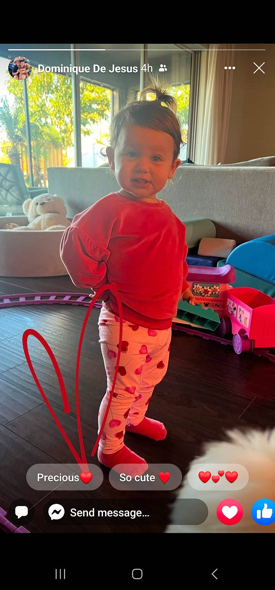 Devyn is registered to the contest to win money with this photo: audio_equipment, baby, carmine, child, event, flooring, fun, gadget, leisure, magenta, pajamas, person, pink, play, room, sitting, t_shirt, thigh, toddler