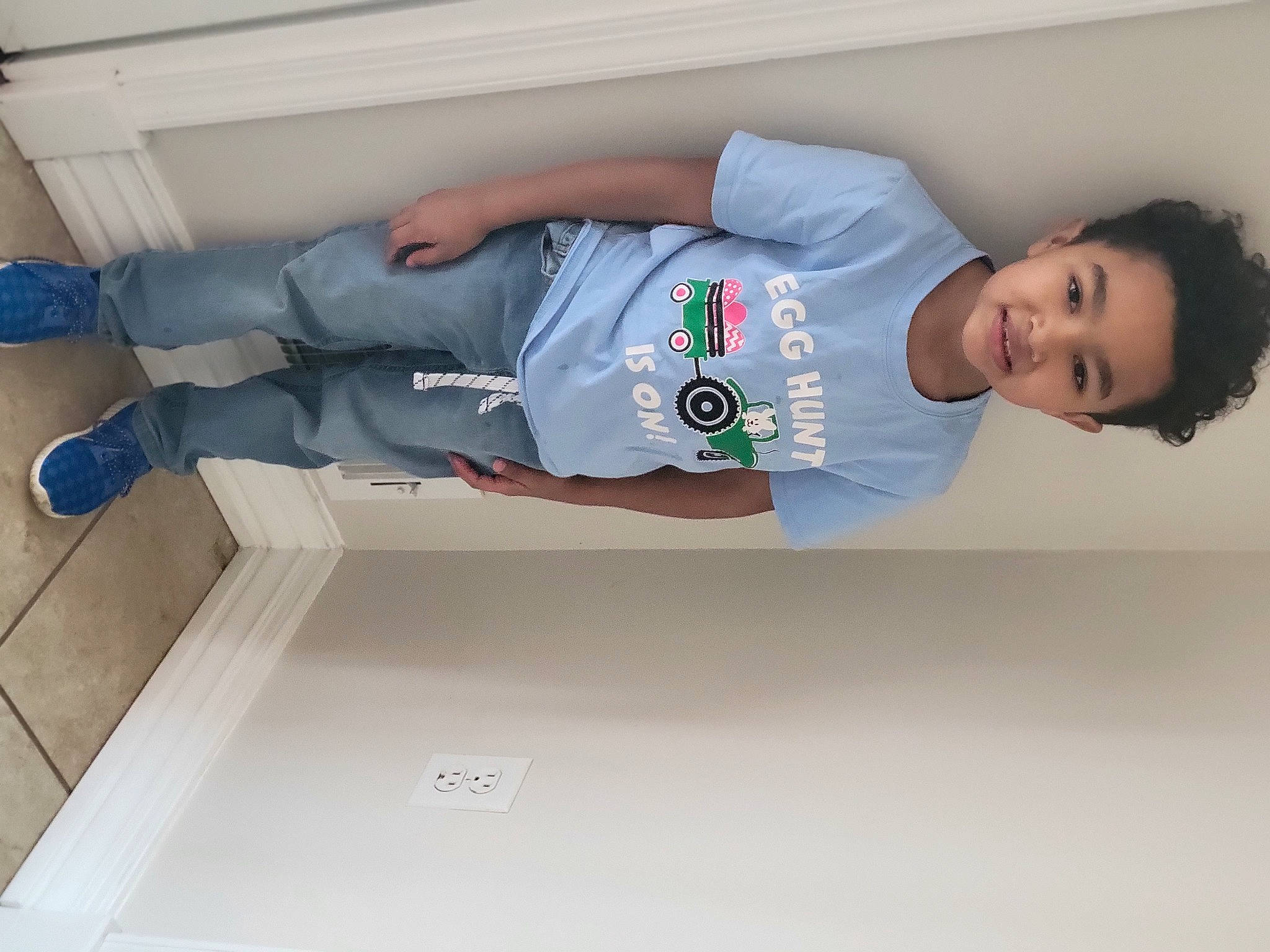 Londen joined the competition — help win amazing prizes! baby_toddler_clothing, child, collar, comfort, denim, elbow, electric_blue, human_leg, jeans, joy, knee, leg, person, sitting, sleeve, smile, sneakers, sportswear, t_shirt, thigh