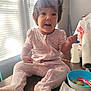 Madeline is registered to the contest to win money with this photo: baby, bottle, bowl, child, cute, expression, face, food, grocery_bag, hair, indoor, messy, pajamas, paper_towel, sitting, spoon, sunlight, table, toddler, window_blinds