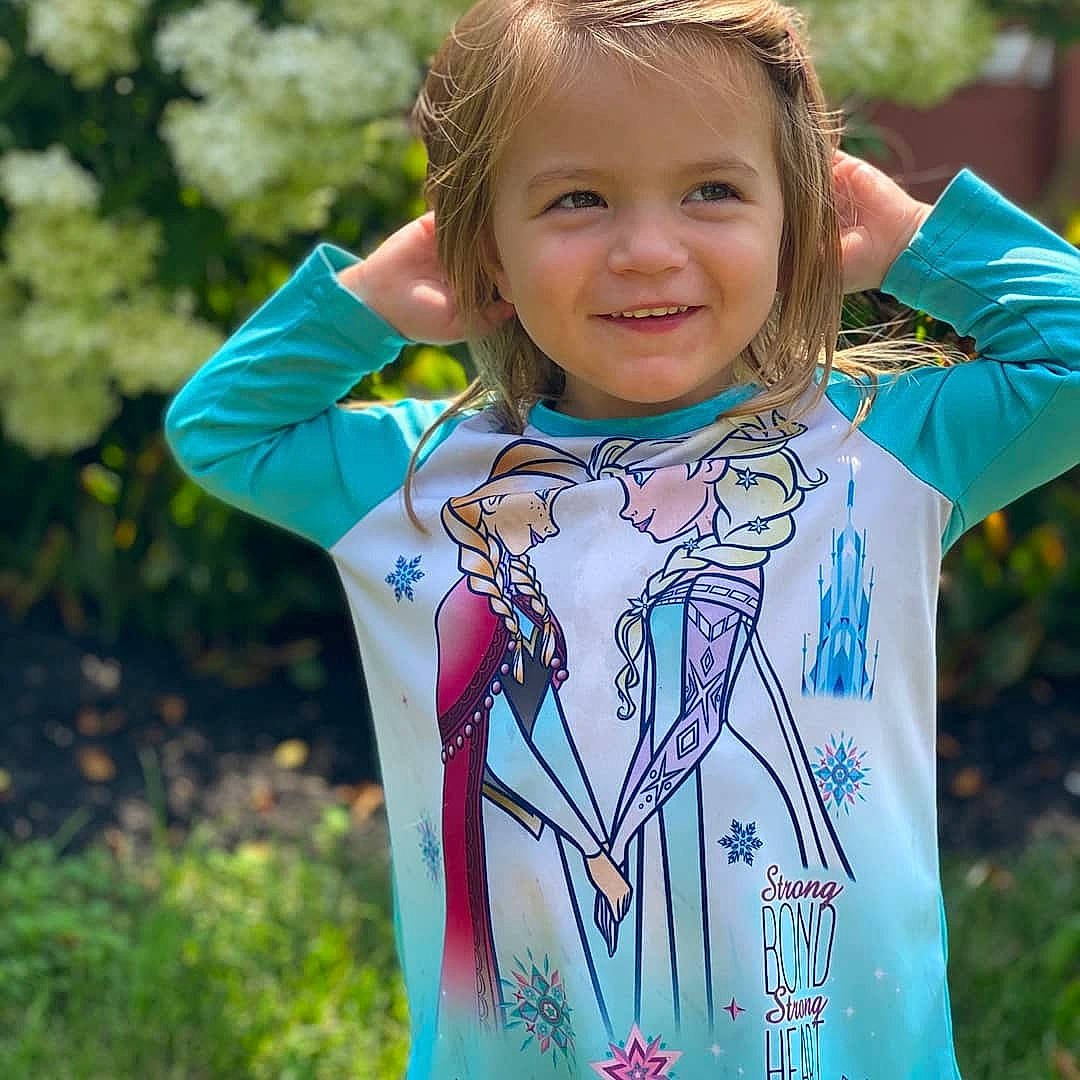 Lilith Violet Dawn is registered to the contest to win money with this photo: child, iris, joy, person, plant, scarf, sleeve, spring, style, t_shirt, textile, tree